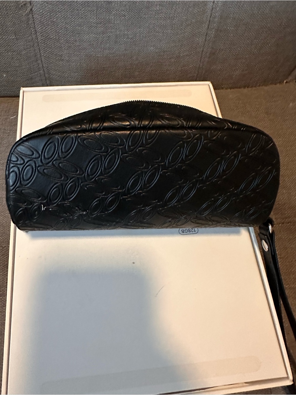 Oakley Black Embossed Leather Wristlet Clutch